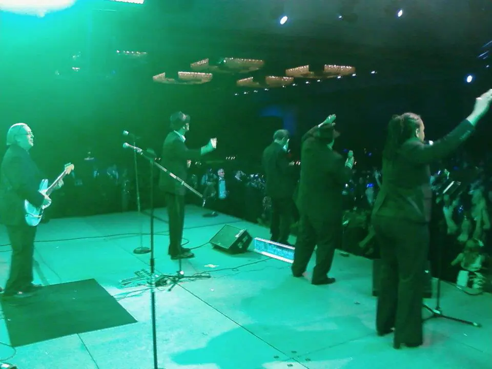 398702_331127810238504_600562159_n A group of people standing on the stage
